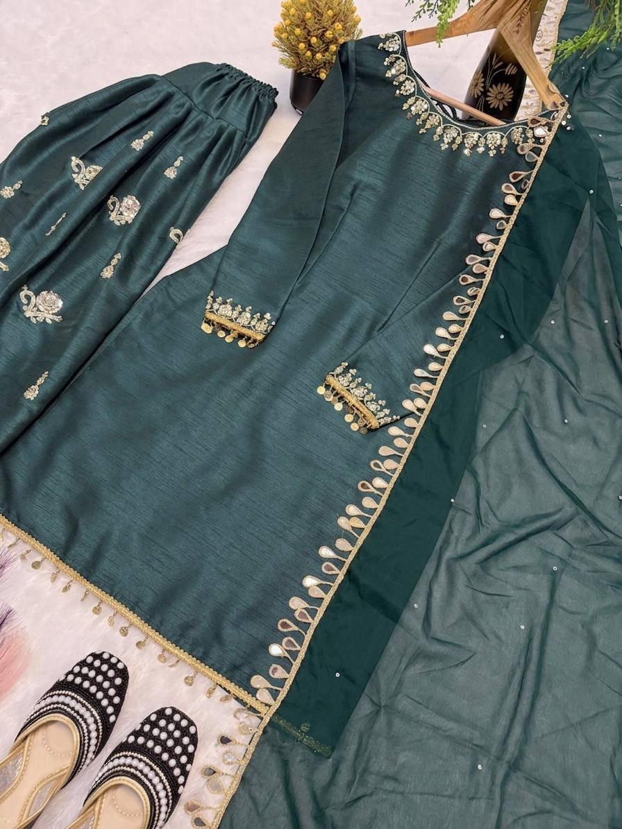 Majestic Emerald Green Kurta and Salwar Suit Set Featuring Intricate Gold Embroidery, Floral Motifs, and Ornate Coin Tassel Embellishments